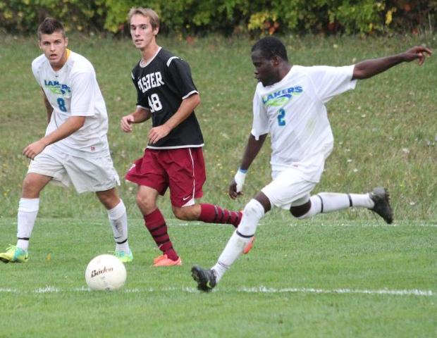 Former Laker Michael Cooper (2) was named Team MVP for the 2012 season